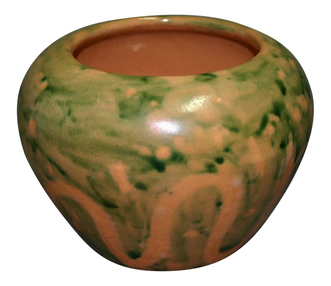 1960s North Dakota School of Mines Pottery Bowl: North Dakota School of Mines 1960 pottery bowl. In sherbert orange and light to dark green colors. It measures 4 3/4" tall and 6 1/2" wide. It is stamped "University of North Dakota, Grand Forks,