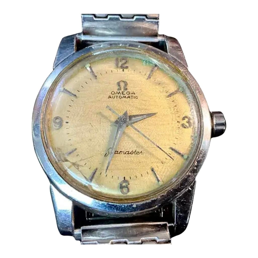 Mid 20th Century Omega Seamaster Automatic Men's Watch: Vintage Omega Seamaster Automatic Men's Watch, circa 1950's. Stainless steel watch features a vintage Speidel USA stretch band with 34mm case and champagne colored dial background. The band was a popu