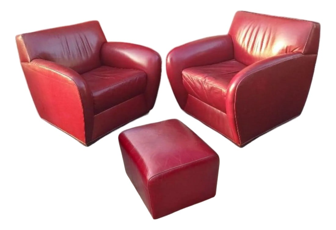 Vintage Italian Leather Club Chairs by Cabot Wrenn & Ottoman, 3 Pieces: Elevate your space with this stunning pair of vintage Italian leather club chairs with a matching Ottoman, a true testament to timeless design and craftsmanship. These chairs, in a rich, deep red leat