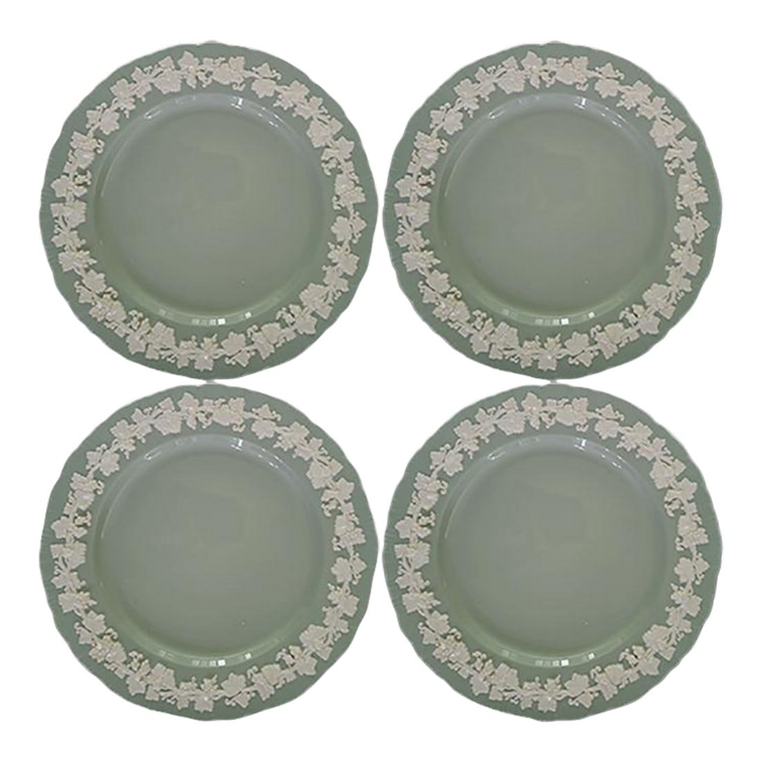 Wedgwood Dinner Plates Cream on Celadon Shell Edge - Set of 4: Set of 4 Wedgwood Queensware Embossed Cream on Celadon (or Green) shell edge Dinner Plates made of porcelain or fine glazed earthenware. Made in England The design features a light green body with an