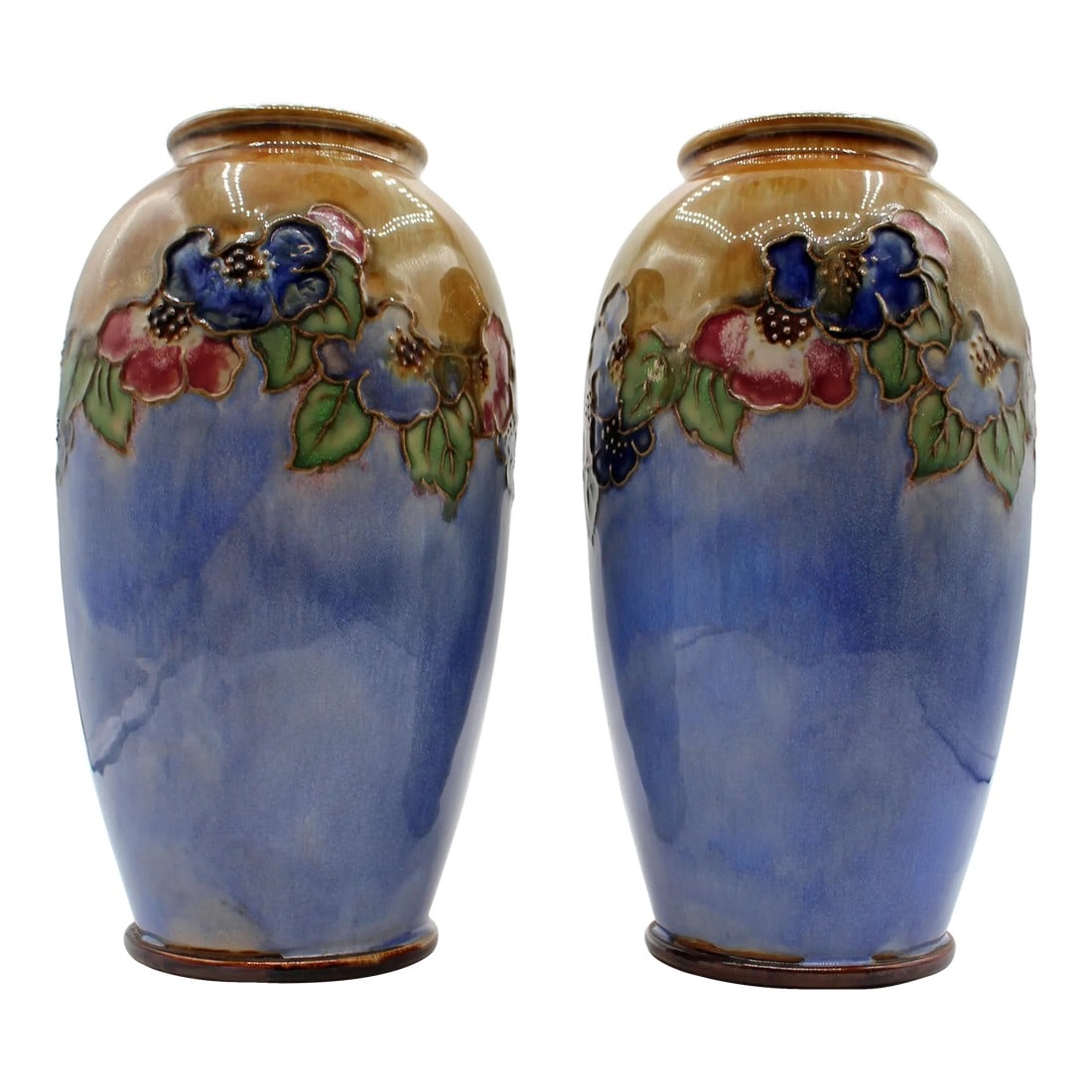 1920-1927 Pair of Arts & Crafts Vases by Royal Doulton, England: Pair of Arts & Crafts Vases by Royal Doulton, 1920-1927, England. Ovoid shape stoneware vase, by either Maud Bowden or Mary Butler (signed MB). The tube-lined band of flowers is separated by light