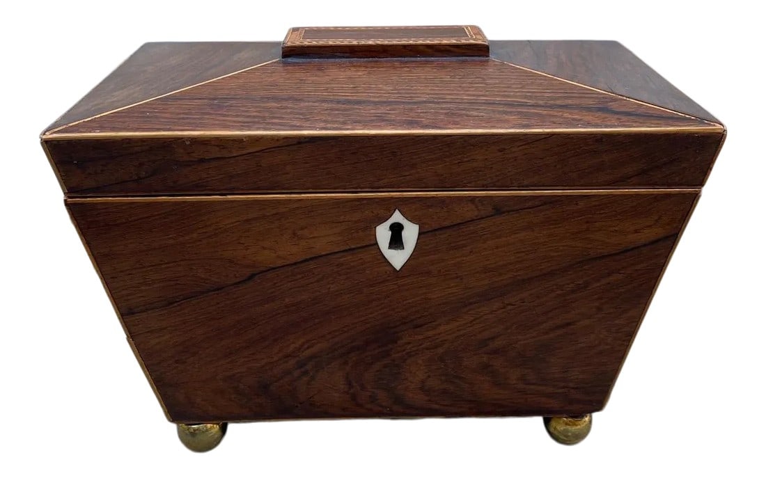 19th Century British Georgian Inlaid Sarcophagus Tea Caddy: All original early 19th century English Georgian inlaid tea caddy in sarcophagus form. The body has a hinged lid with original red top, beautiful escutcheon, knobs and bun feet. Original condition,
