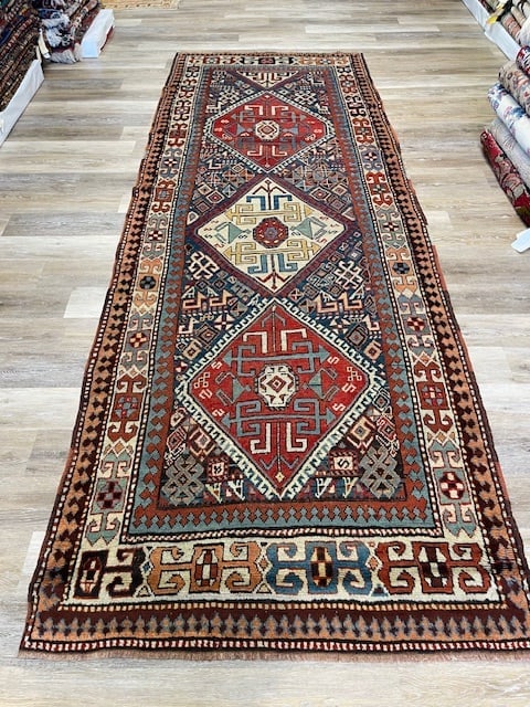 19th Century Kazak Caucasian runner: Title:19th Century Kazak Caucasian runner Description:Powerful antique Kazak caucasia, from southwest Caucasus with beautiful colors, size 4 ft. 8 inches by 9 ft. 10 inches, circa 1890, excellent cond
