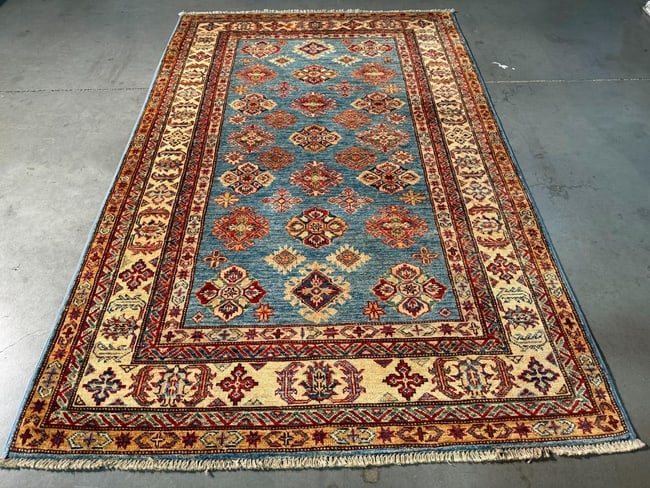 Fine Super Kazak Rug 4.1x6.1: Title:Fine Super Kazak Rug 4.1x6.1 Description:4.1x6.1 Super quality Kazak Rug in Antique finish , hand spun and hand knotted in Pakistan 100% natural Veggey Dye wool Pile , in Silky blue , Ivory and
