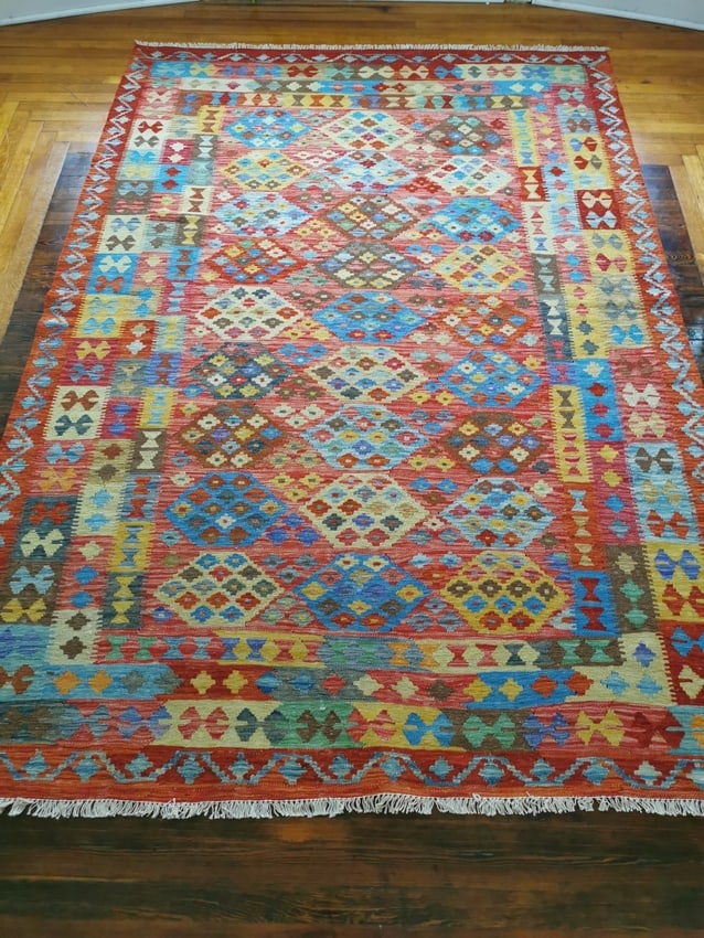 Kelim 6.6x9.4: Title:Kelim 6.6x9.4 Origin:Afghanistan Year:New Materials:wool Size:6.6x9.4 Description:Kelim Reserve: $360.00 Shipping: Domestic: Flat-rate of $70.00 to anywhere within the contiguous U.S.