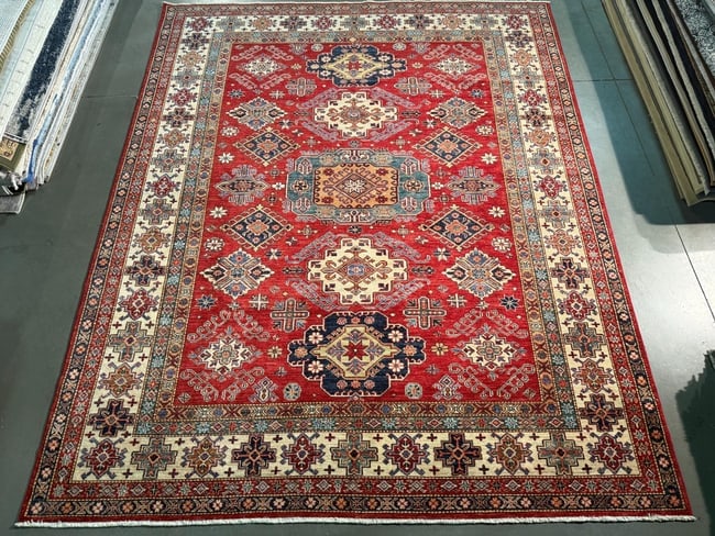 Magnificent Super Kazak Rug 8x9.9: Title:Magnificent Super Kazak Rug 8x9.9 Description:8x9.9 Super quality Kazak Rug, hand spun and hand knotted rug in Pakistan 100% Vegge Dye natural wool pile , in silky high sheen Red , Ivory and mul