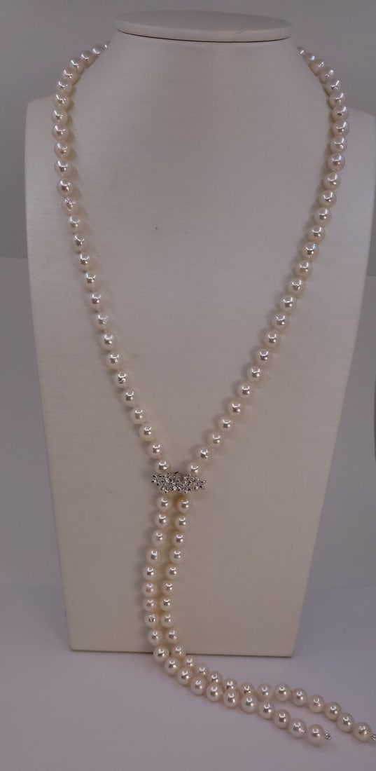 Necklace 7x7.5mm Double Akoya Pearls, Silver: Title: Necklace 7x7.5mm Double Akoya Pearls, Silver Description: A beautiful double pearl necklace of white saltwater Akoya pearls with exceptional lustre, finished with a 925 sterling silver clasp. T