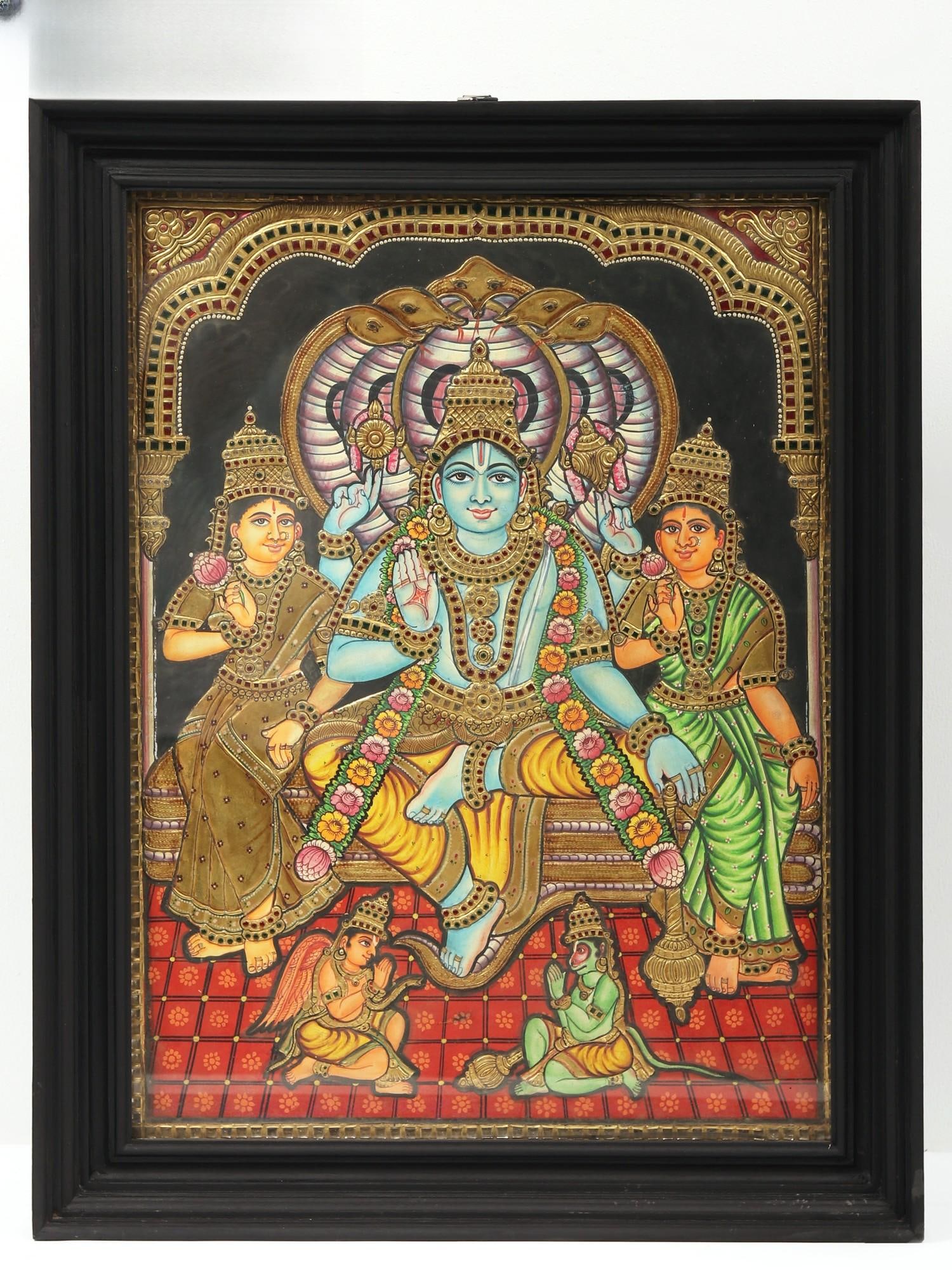 Lord Vishnu with Bhu Devi and Shri Devi - Tanjore Painting with Frame | Traditional Colors with Gold: Title: Lord Vishnu with Bhu Devi and Shri Devi - Tanjore Painting with Frame | Traditional Colors with Gold Work Description: Tanjore (Thanjavur) Painting Reserve: $1,007.10 Shipping: Domestic: Shippi