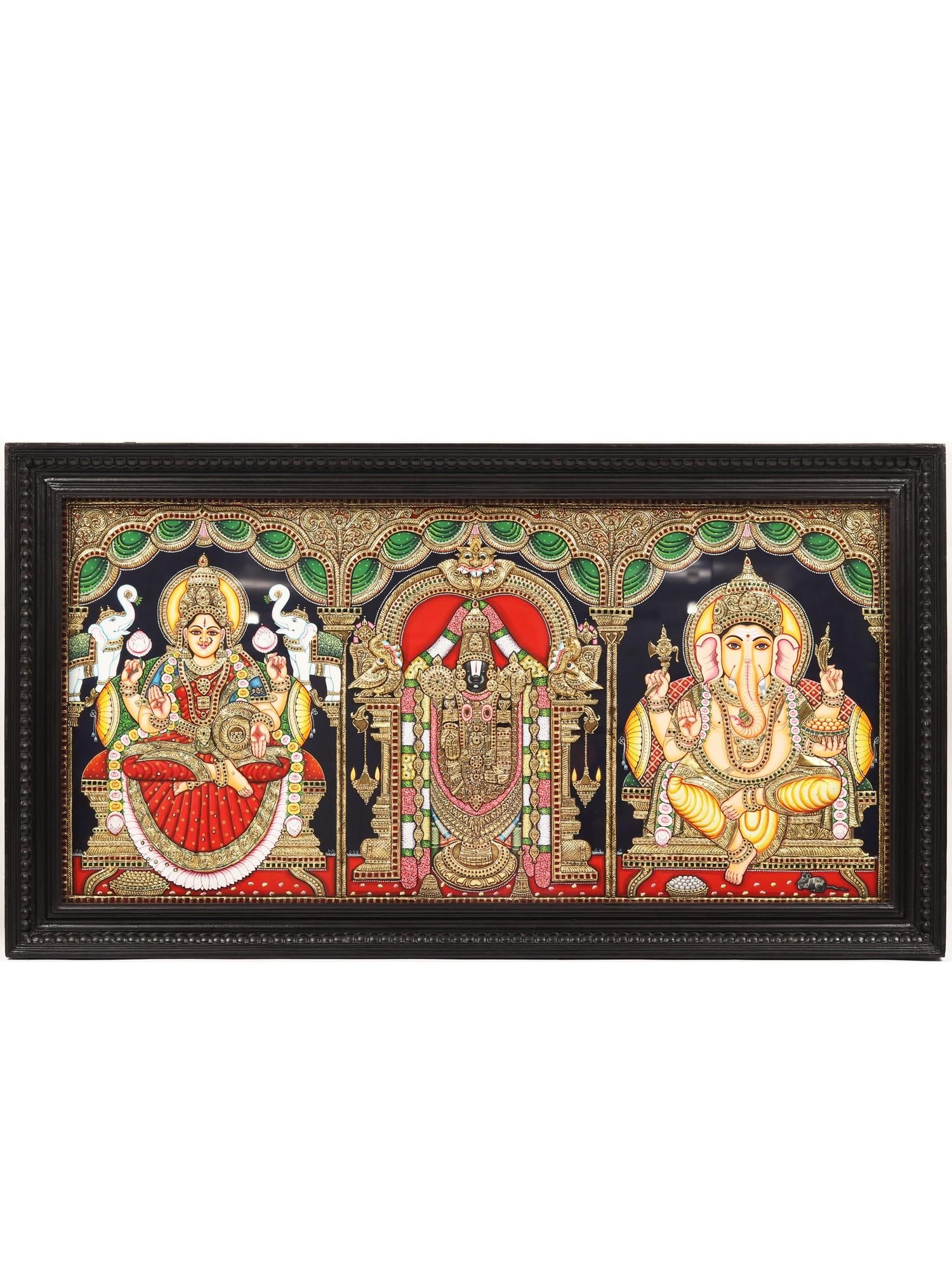Gajalakshmi, Tirupati Balaji (Venkateshvara) and Ganesha | Tanjore Painting with Frame: Title: Gajalakshmi, Tirupati Balaji (Venkateshvara) and Ganesha | Tanjore Painting with Frame Description: Tanjore (Thanjavur) Painting Reserve: $1,907.10 Shipping: Domestic: Shipping rates are determ
