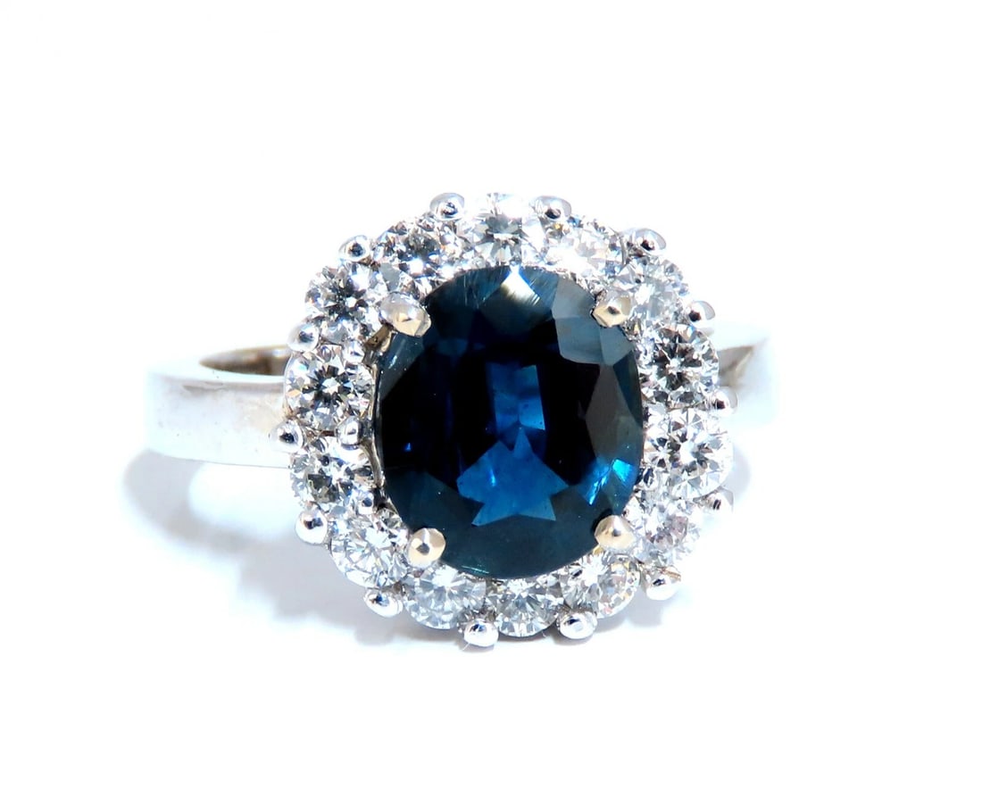 GIA Certified 2.54ct Natural Blue Sapphire Diamond Ring 14 Karat**: Title: GIA Certified 2.54ct Natural Blue Sapphire Diamond Ring 14 Karat** Description: Classic Halo Cluster GIA Certified 2.54ct. Natural Blue Sapphire ring. Report: 1355608477 Oval cut: 9.21 x 7.80 x