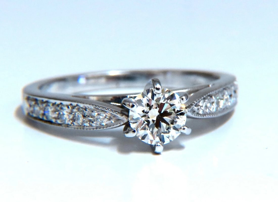 .50ct Natural Round Cut Diamond Ring H/VS 14kt gold**: Title: .50ct Natural Round Cut Diamond Ring H/VS 14kt gold** Description: Vintage Elegance .50ct Natural Round Cut Diamond 5mm Diameter Vs-2 clarity H color. Side round Diamonds: .26ct H-color Vs-2 Cl
