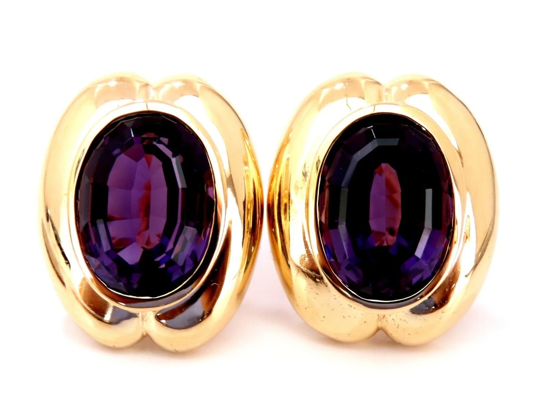 34ct natural oval purple amethyst clip earrings 14kt**: Title: 34ct natural oval purple amethyst clip earrings 14kt** Description: Natural Vivid Purple Amethyst Clip Earrings. 34ct natural vivid purple amethyst. 14x11 mm each 14 karat yellow gold 18.9