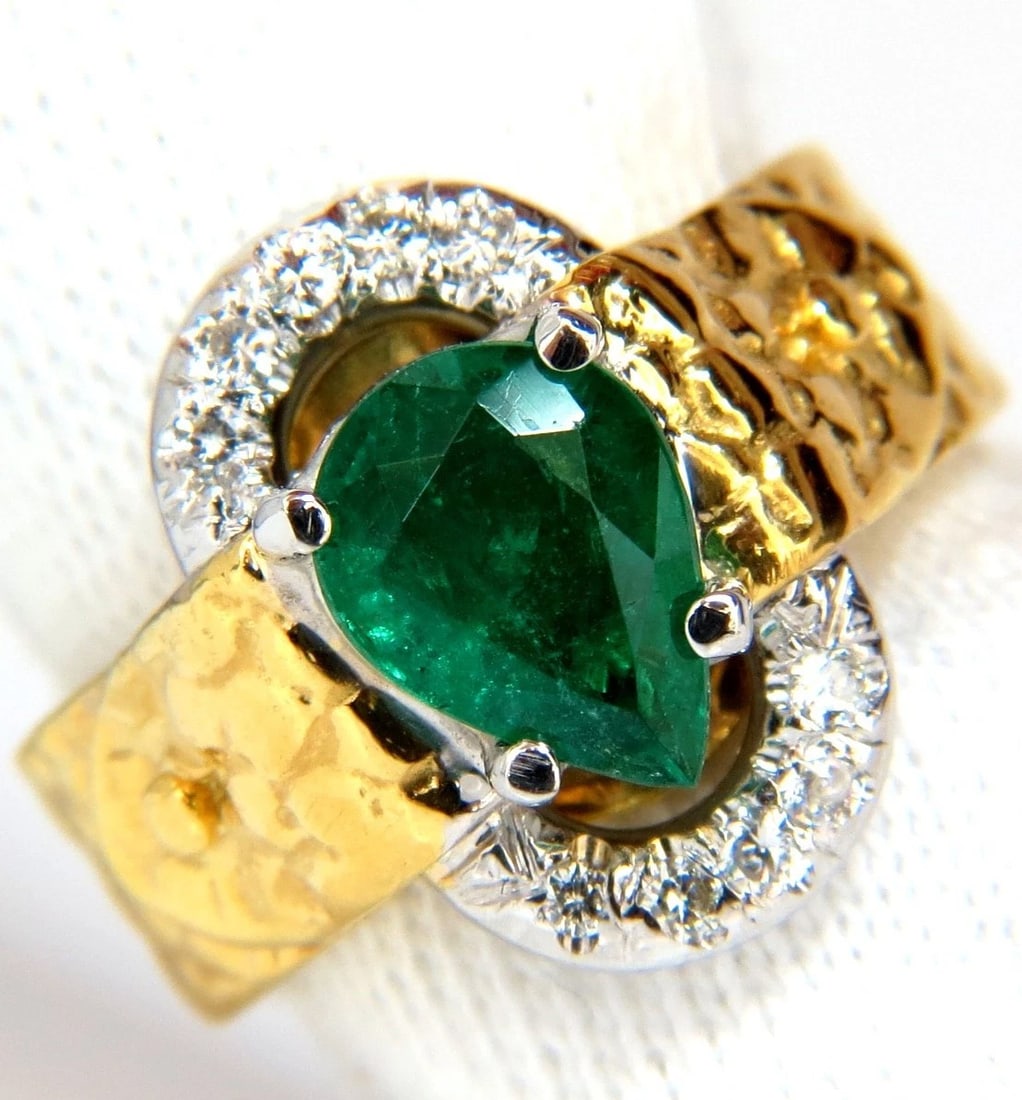 18KT GOLD 1.90CT NATURAL EMERALD DIAMOND RING HAMMERED DECO**: Title: 18KT GOLD 1.90CT NATURAL EMERALD DIAMOND RING HAMMERED DECO** Description: Gorgeous & Different, Scaling pattern on shank & clipped over loop detailed design. 1.60ct. Brilliant Natural emerald 