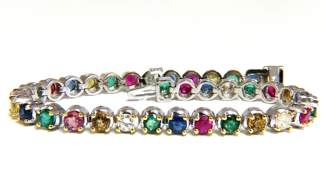 7.36ct natural ruby emerald sapphires diamond tennis bracelet 14kt gold**: Title: 7.36ct natural ruby emerald sapphires diamond tennis bracelet 14kt gold** Description: Gem Line. 6.50ct. Natural Sapphires, Ruby, & Emeralds bracelet. Full round cuts, great sparkle. Multi-colo