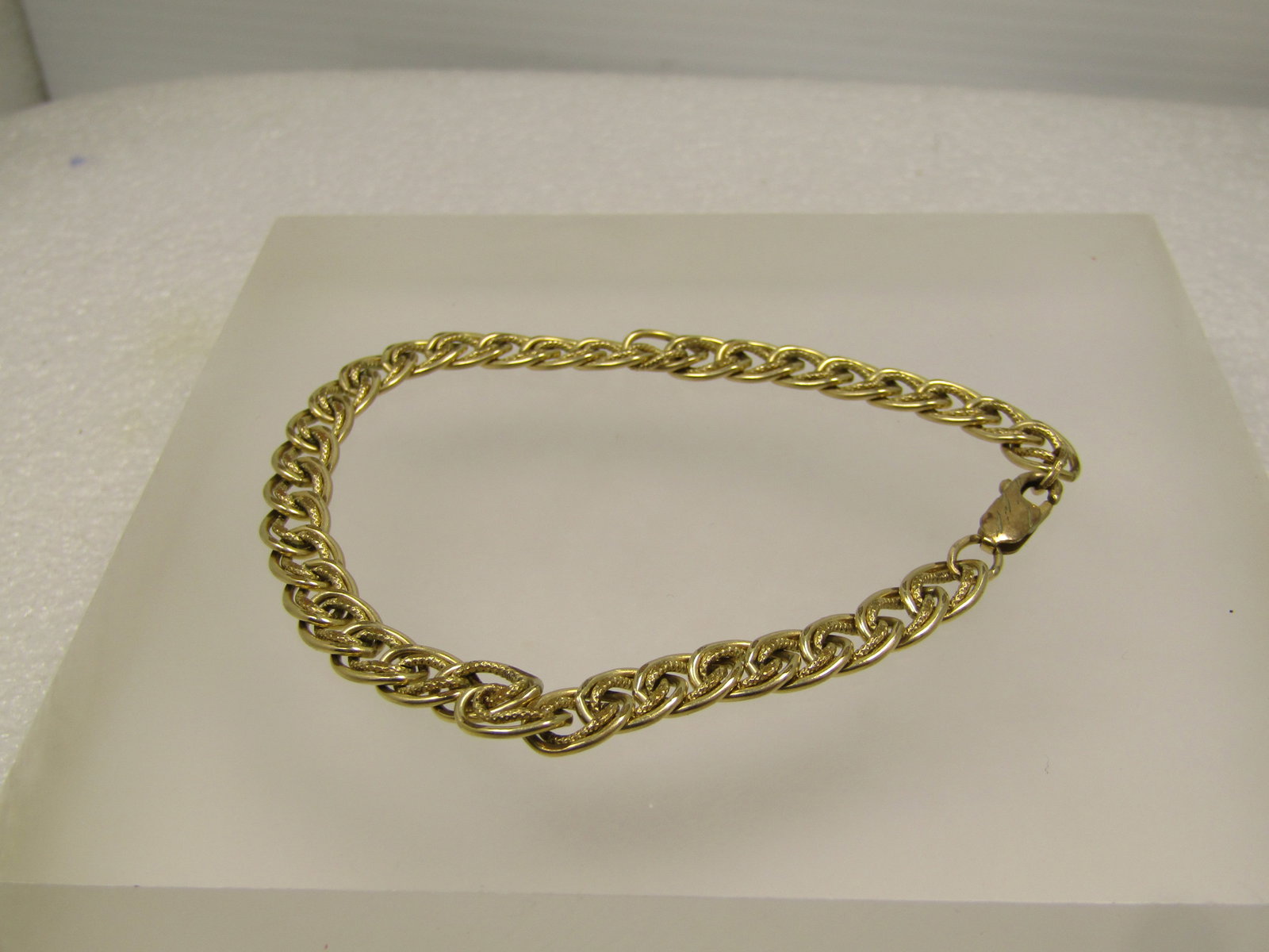 Vintage Gold Filled Double Link Bracelet, 7.25", 1980's: Vintage Gold Filled Double Link Bracelet, 7.25", 1980's. Lobster clasp that has etched markings giving it a look of an older bracelet - it is marked 1/20 12kt G.F. on the clasp. The braceleth has a sm