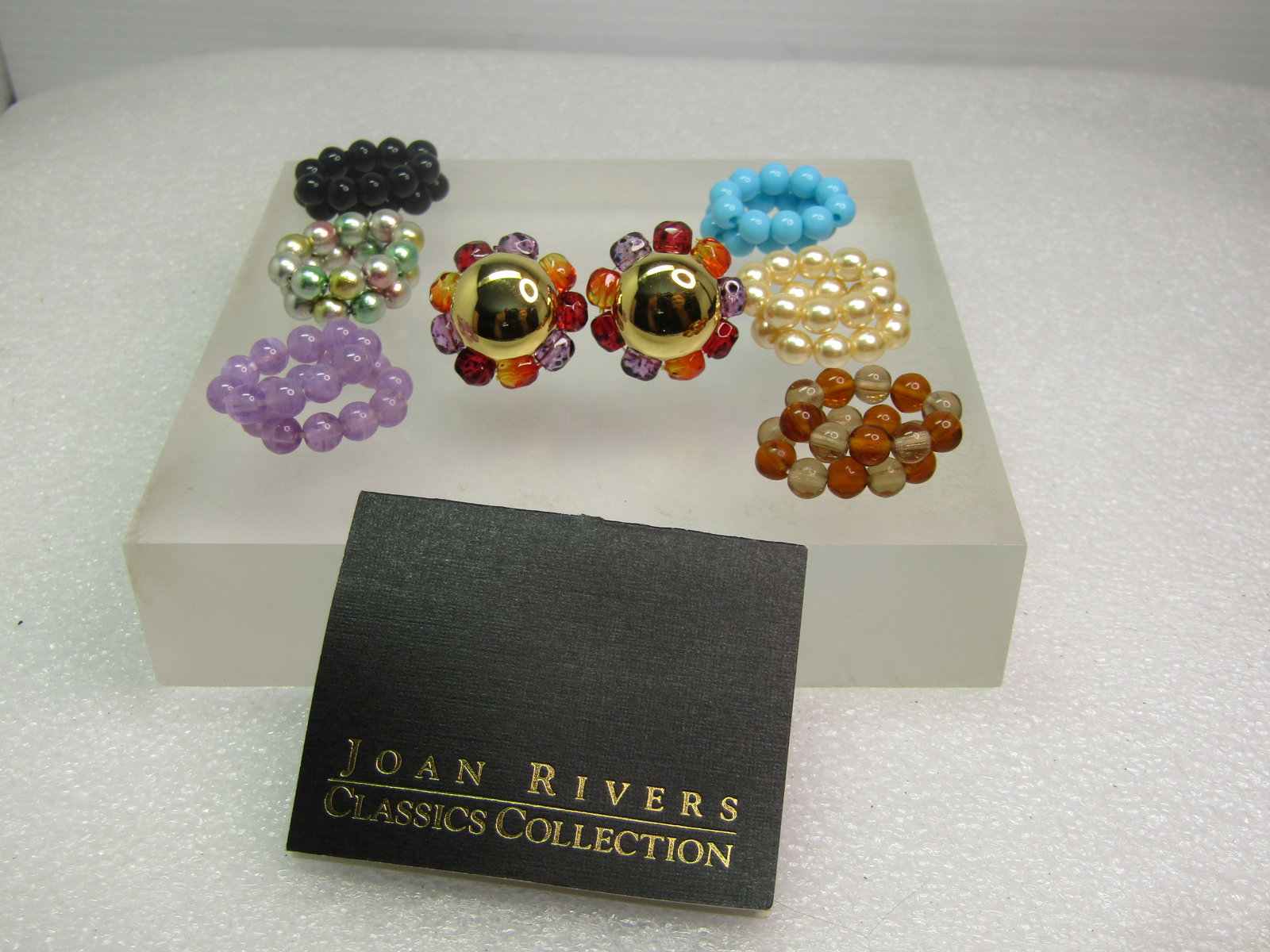Vintage Joan Rivers Beaded Interchangeable Enhancer Earrings, Pierced. 1990's: Vintage Joan Rivers Beaded Interchangeable Enhancer Earrings, Pierced. 1990's. Gold tone 14mm rounded dome center to the pierced earrings with a recessed area beneath where you can slip on one of the 