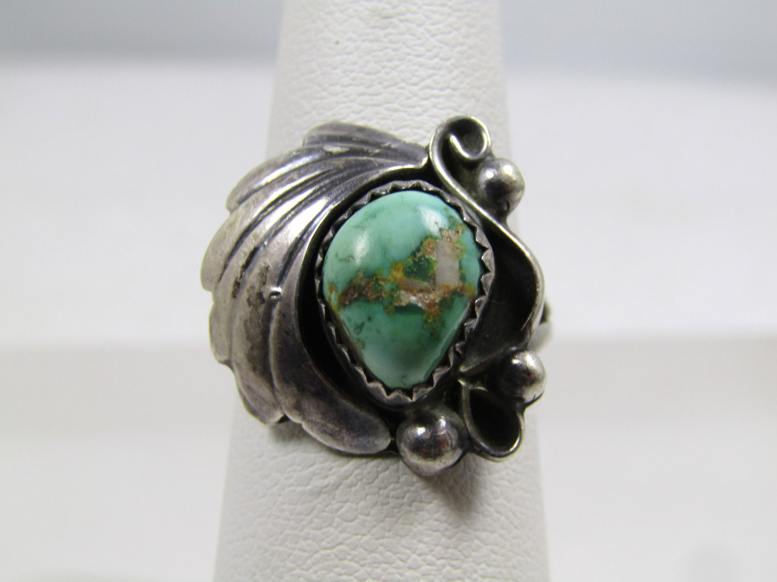 Vintage Sterling Southwestern/Navajo Turquoise Ring, Signed R. Shake, 1970's: Vintage Sterling Southwestern/Navajo Turquoise Ring, Signed R. Shake, 1970's is the estimated age. This is marked sterling and signed R. Shake in two places. It has a sawtooth bezel-setting for the pe