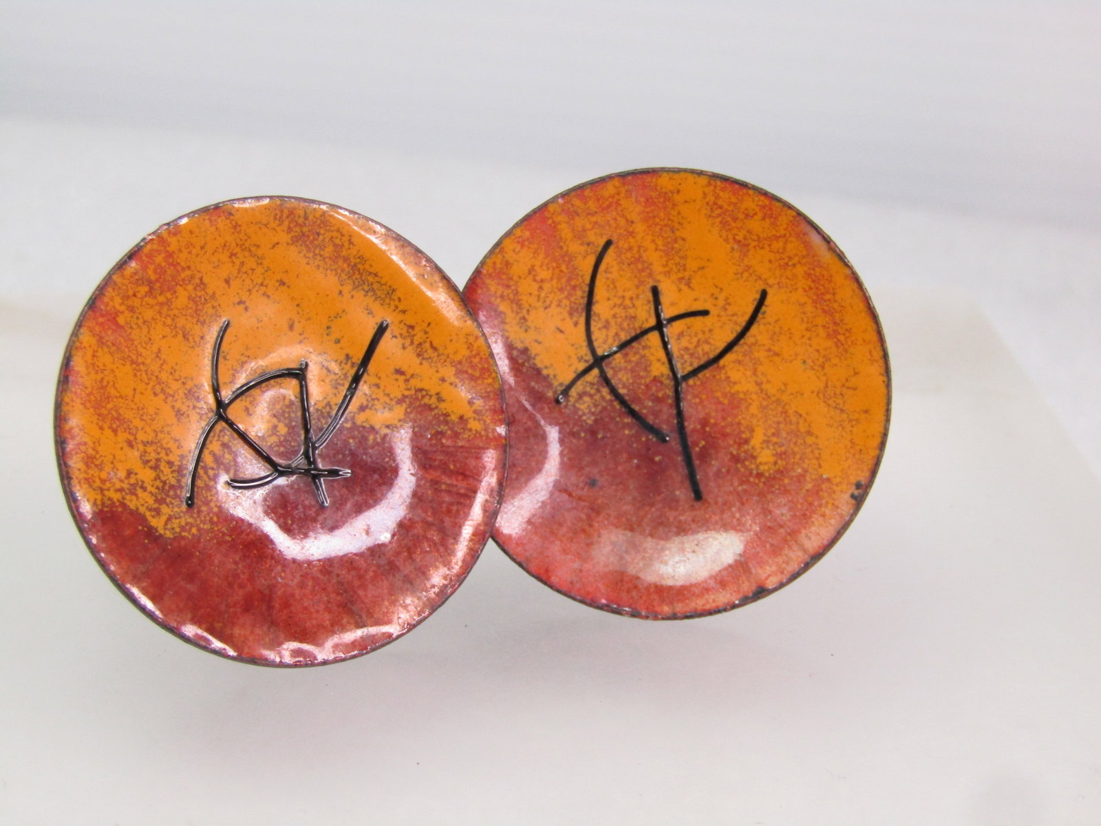 Vintage Enameled Copper Mod/Abstract Cufflinks, 191950's-1960's.: Vintage Enameled Copper Mod/Abstract Cufflinks, 191950's-1960's. Black enameling and heat golden and amber enameled cufflinks with black raised accents. They are round and slightly concave with an