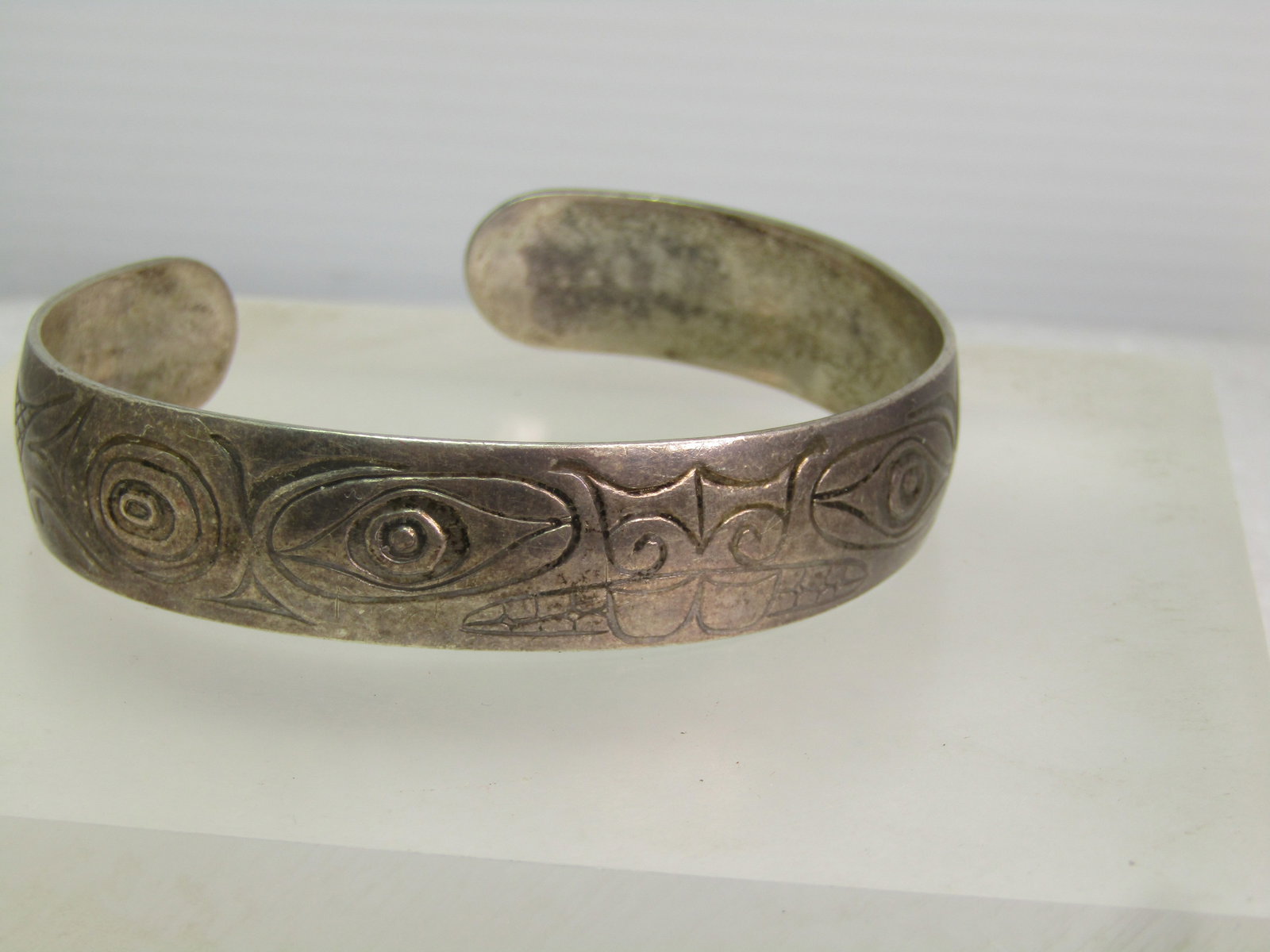 Vintage Sterling Cuff Bracelet, Engraved Egyptian Design, 6.75", 1960's-1970's, Unisex: Vintage Sterling Cuff Bracelet, Engraved Possibly Egyptian Design, Owl, Eye more, 6.75", 1960's-1970's. Unisex, It has ow l like designs and eyes and other scrolled marks. This has the look of Egyptia