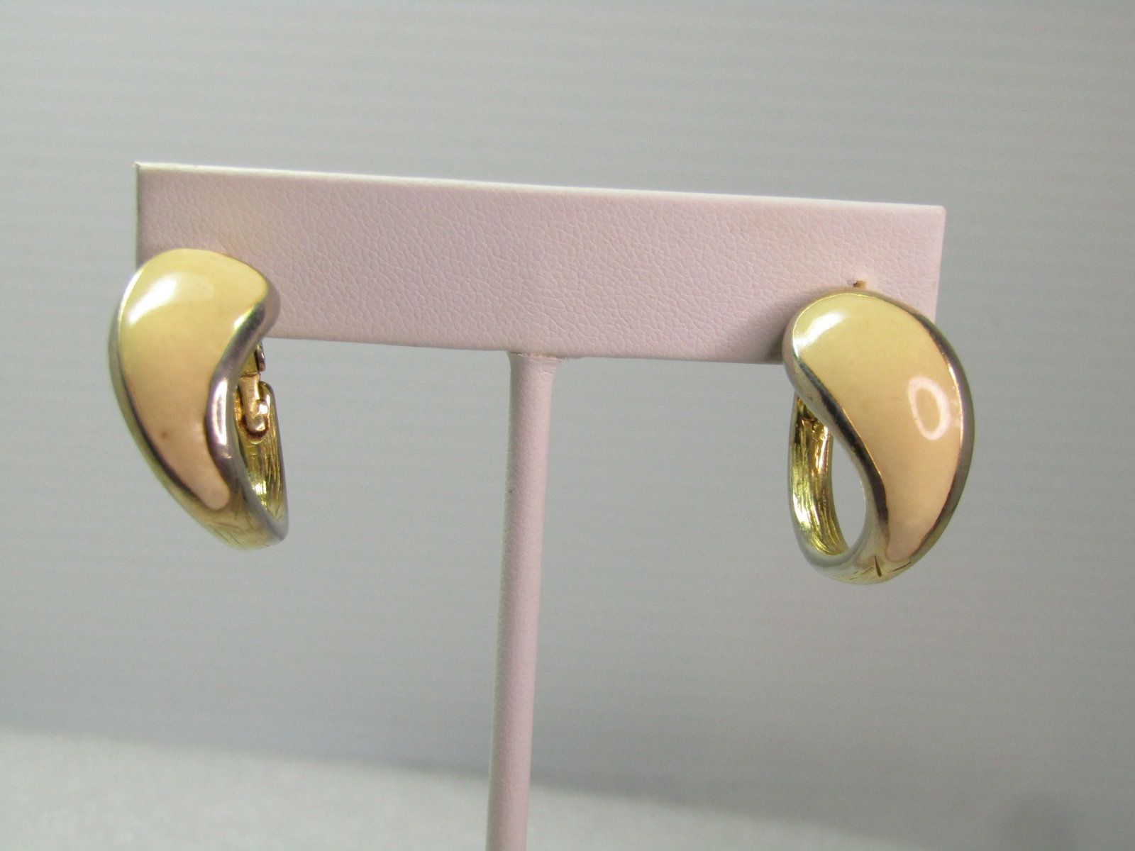 Vintage Goldette Enameled Hoop Earrings, Pierced, 1960's: Vintage Goldette Enameled Hoop Earrings, Pierced, 1960's. Gold tone with with a curved and wider top, enameled around the front and tapering from wider on top to thinner toward the bottom and the all 