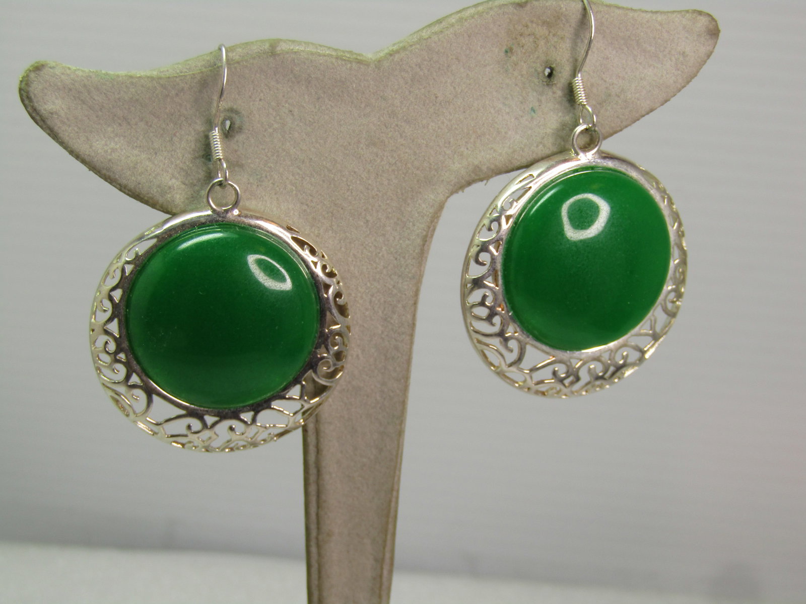 Silver Plated Filigree Green Earrings, Pierced, 1990's.: Silver Plated Filigree Green Earrings, Pierced, 1990's or after. This has a one inch green disc set on th e top which fills much of the earrings - that does test in the jade range on a Presidium. It i