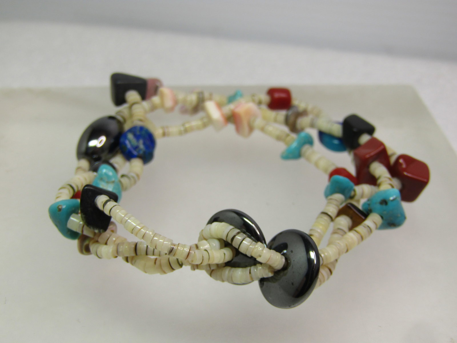 Vintage Southwestern Heishi Shell/Turquoise/Agate Bracelet, Triple Strand, 7.25", 1980's-1990's: Vintage Southwestern Shell/Turquoise/Agate Bracelet, Triple Strand, 7.25", 1980's-1990's. Heishi shell beads with larger nuggets between with hematite, red agate, larger shell, turquoise, azurite.
