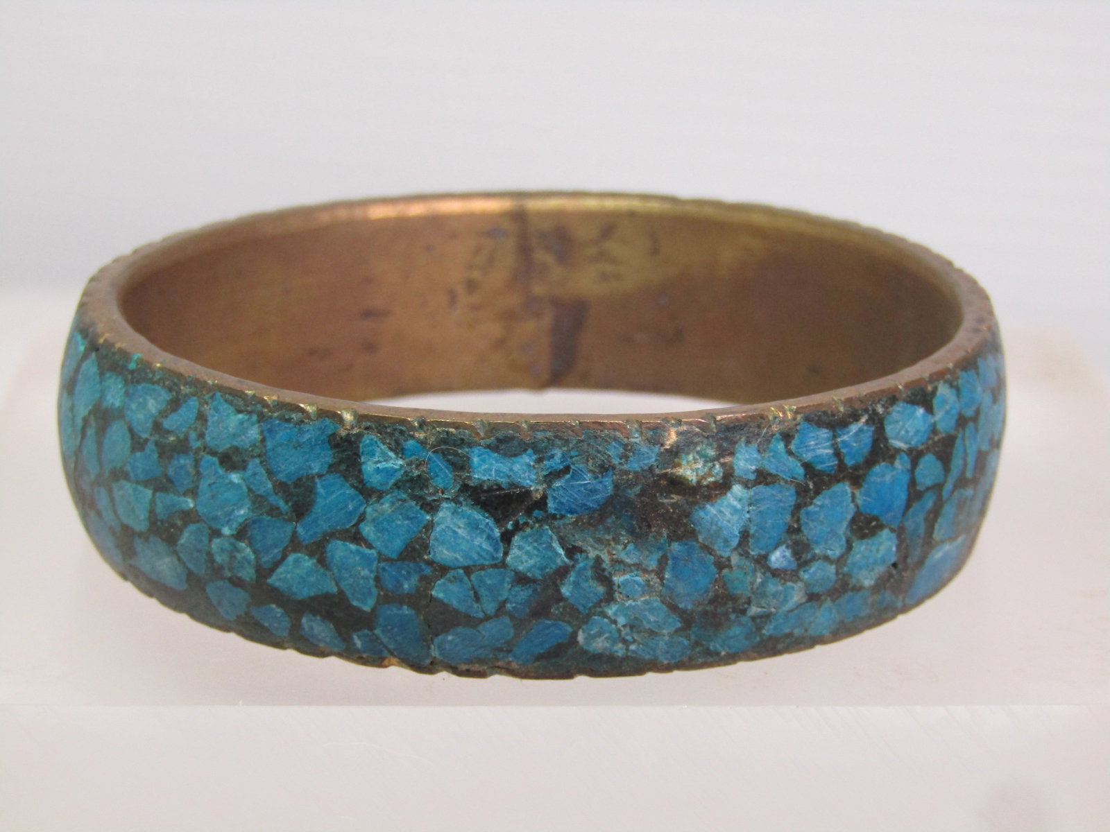 Vintage Brass & Inlaid Turquoise Chip Bangle Bracelet, 8.25, India, Unisex, 1960's: Vintage Brass & Inlaid Turquoise Chip Bangle Bracelet, 8.25, Unisex, 1960's. This is appx. 3/4" wide and slightly domed. A rustic piece with a black background and the turquoise stone chips set in