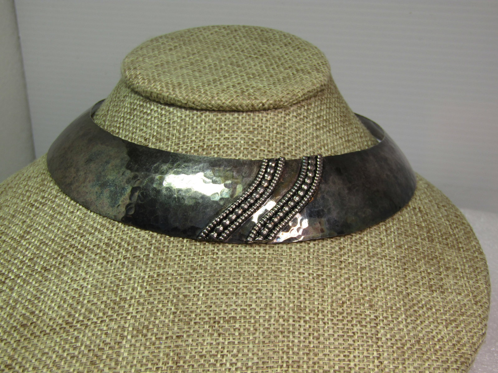 Vintage Hammered Collar Necklace with Faux Marcasite Raised Accents, 15", 1970's-1980's: Vintage Hammered Collar Necklace with Faux Marcasite Raised Accents, 15". 1970's-1980's. This is wider in the front and appx. 1-1/8" wide which slowly tapers down to appx. 1/2" then a point at the bac