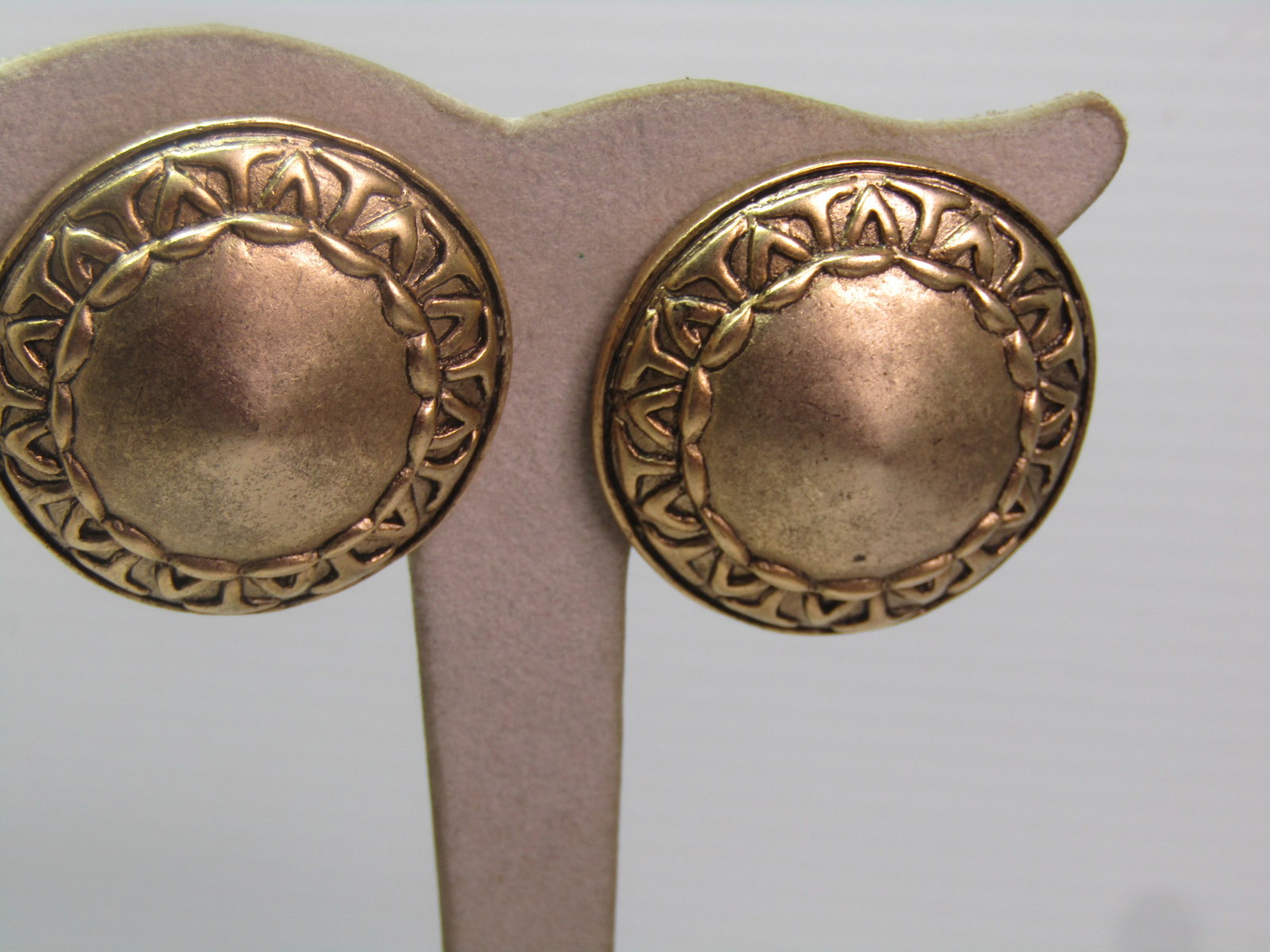 Vintage Domed Clip Earrings, Signed Lazuli, Gold Tone, 1980's: Vintage Domed Clip Earrings, Signed Lazuli, Gold Tone, 1980's. This are an almost pointed domed center with scalloped edges at the inner edges and a V and T like pattern around the outer edge. They ar