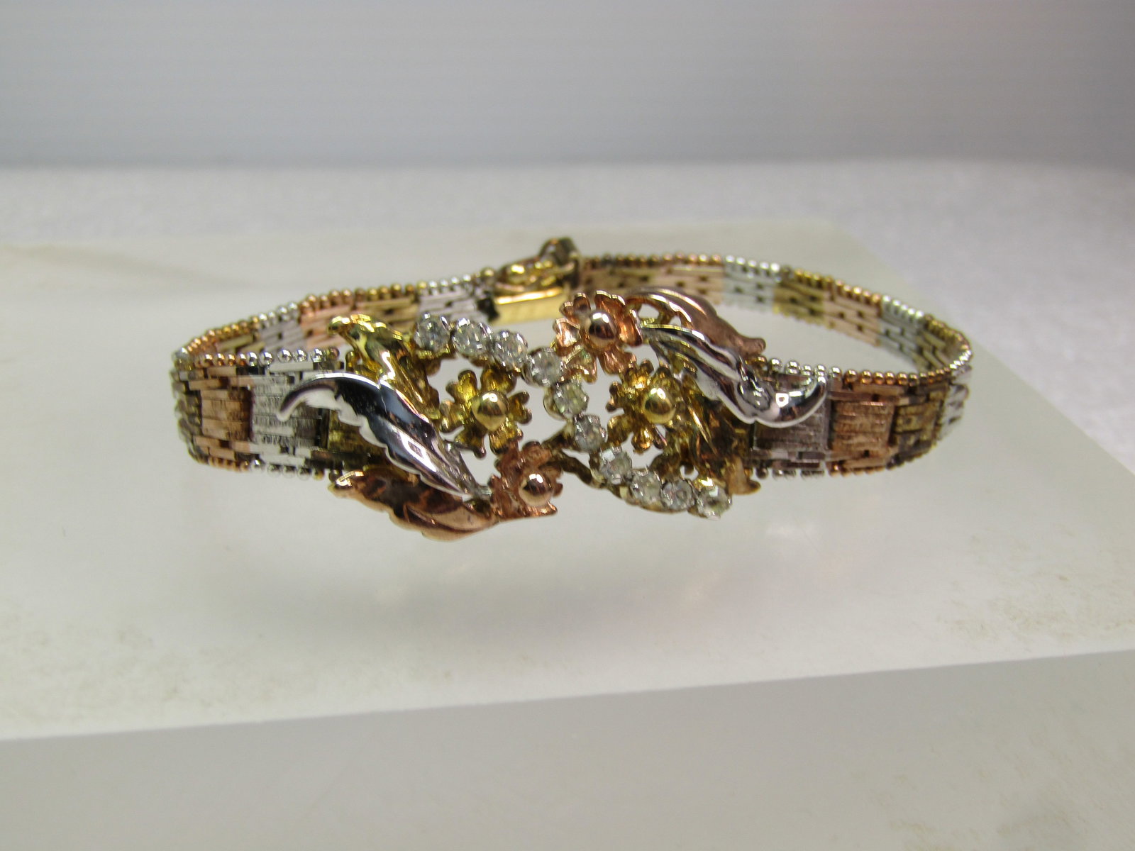Vintage Sterling Vermeil Riccio Bracelet, CZ and Floral Accents, 1990's, 7.25, Signed Milor, Italy: Vintage Sterling Vermeil Riccio Bracelet, CZ and Floral Accents, 1990's, 7.25, Signed Milor, Italy. This is tri-color from sterling to yellow and rose gold vermeil in a tapered riccio link and box
