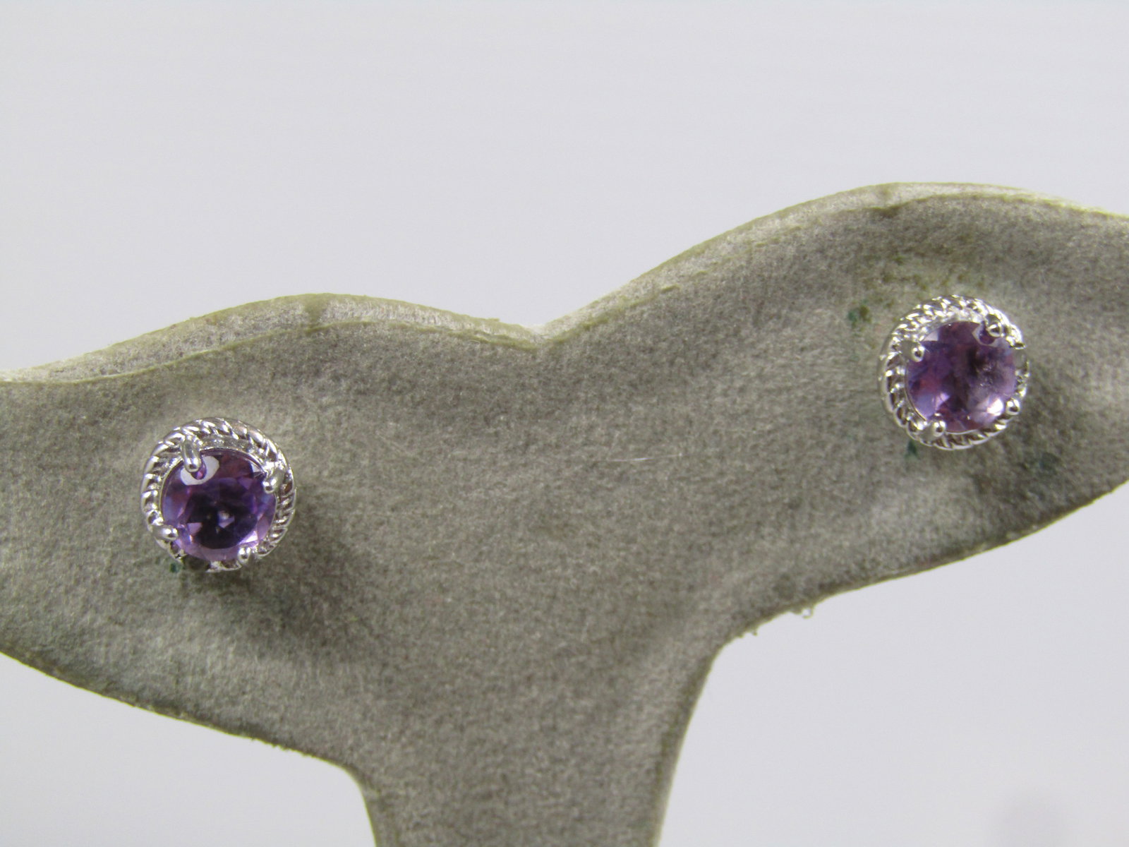 Sterling Amethyst Diamond Chip Earrings, Pierced, Signed, 1990's: Sterling Amethyst Diamond Chip Earrings, Pierced, Signed, 1990's or after. They have a round appx. 5.5mm amethyst prong-set in each earring. They are marked .925 and signed either D&J or DBJ. They hav