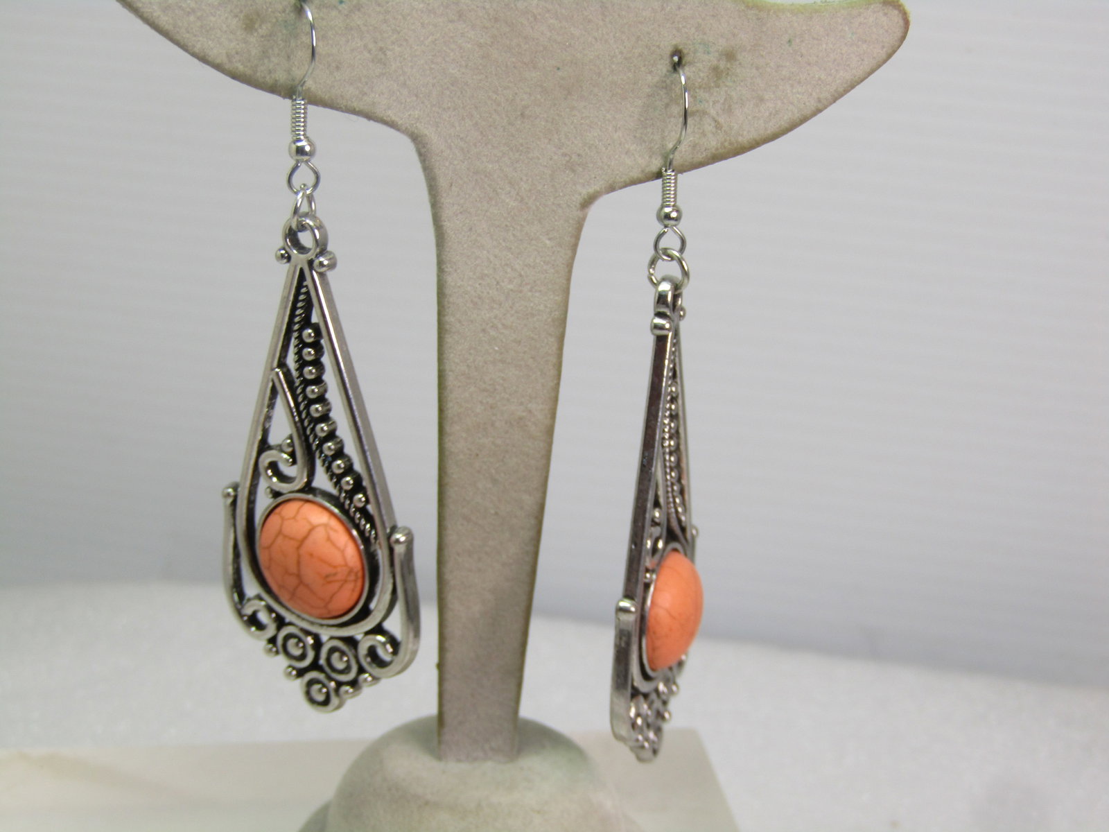 Vintage Faux Orange Agate Drop Earrings, 1990's-2000's: Vintage Faux Orange Agate Drop Earrings, 1990's-2000's. These are silver tne with hook p osts and are appx. 3.25" long from the curved in the post and 1" wide - they have curved and round accents and 
