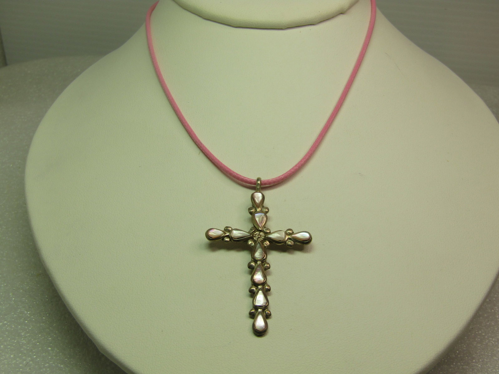 Vintage Sterling Pink MOP Cross Pendant, Pink Cord Necklace, 18"-20", 1980's-1990's, Southwestern: Vintage Sterling Pink MOP Cross Pendant, Pink Cord Necklace, 18"-20", 1980's-1990's. Southwestern themed. The cross is appx. 2" tall and 1.25" wide with bezel-set pink mother-of-pearl pear-shaped acce