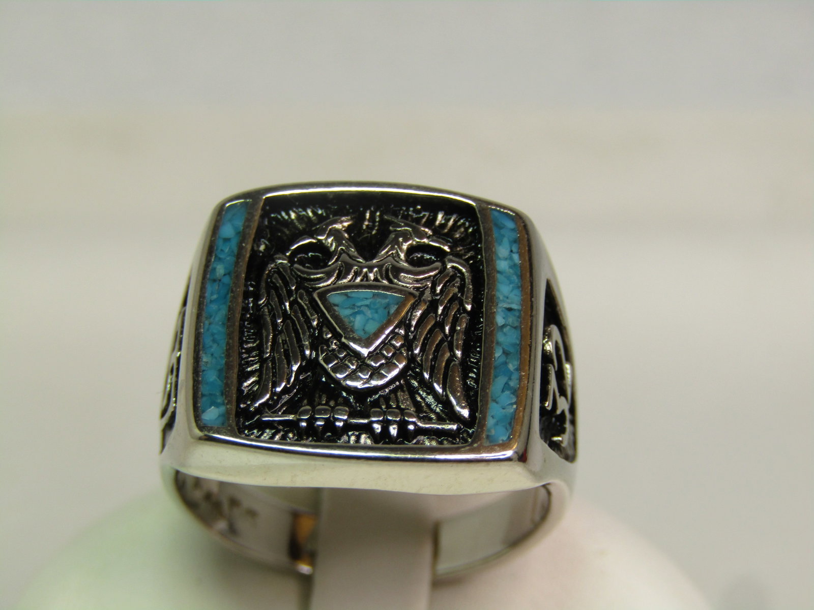 Silver Tone Masonic 32 Ring, Sz. 10, Turquoise Chips. 1990's: Silver Tone Masonic 32 Ring, Sz. 10, Turquoise Chips. 1990's. This looks as if it is vintage new stock. It came from a reseller's estate with no signs of wear. It has the double eagle on the top with 