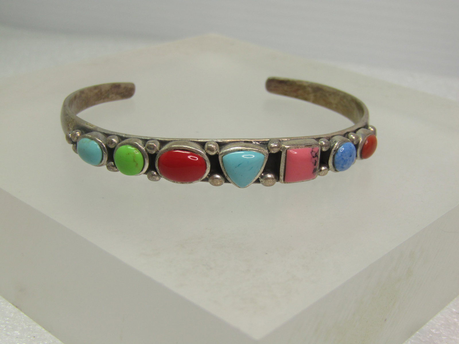 Vintage Sterling Southwestern Cuff Bracelet, 6.5 Faux Turquoise & More, 1980's: Vintage Sterling Southwestern Cuff Bracelet, 6.5 Faux Turquoise & More, 1980's, This has seven stones that are in different shapes and believed to be faux or simulated semi-precious stones like: Carne