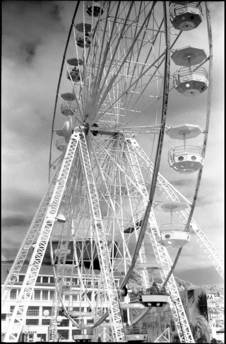 Edition 2/10 - Ferris Wheel, Fecamp, France - Silver Gelatin Photograph: Title: Edition 2/10 - Ferris Wheel, Fecamp, France - Silver Gelatin Photograph Dimensions: 16 x 20 in Medium: Edition 2/10 - Ferris Wheel, Fecamp, France - Silver Gelatin Photograph Paul Cooklin Unite