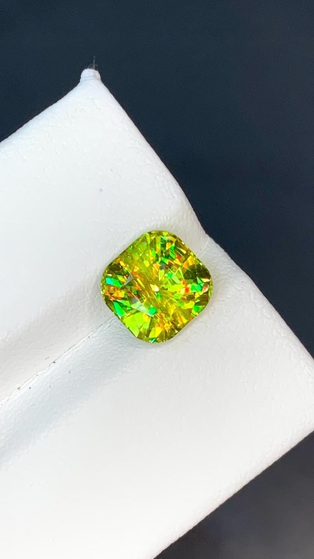 Yellow Green Sparkling Fire Titanite Sphene Gemstone - 2.75 Carat: Highlights Supplies for making crafts Materials: Gemstone: Sphene Carat weight: 2.75 Sphene Details: * Weight : 2.75 carat * Dimension : 7.95*7.82*5.67 mm * Shape : Square Cushion Cut * Color : Yellow