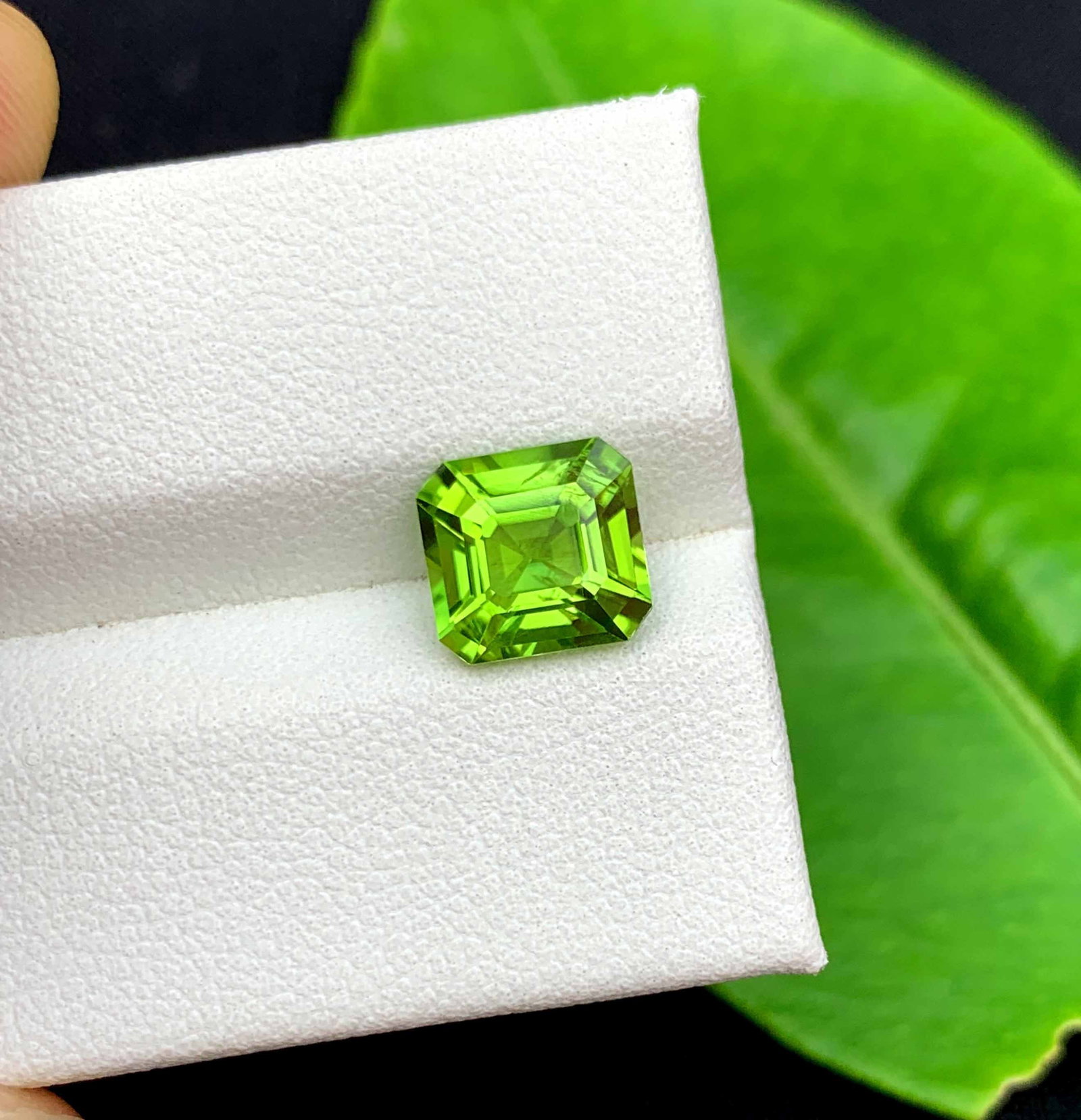 Natural Peridot Gemstone: 2.35 ct Asscher Cut, Pakistan: Highlights Materials: Gemstone: Peridot Carat weight: 2.35 Natural Peridot Gemstones, Assher Cut Peridot Loose Gemstone From Pakistan, August Birthstone weight : 2.35 carat Dimensions : 8*7.2*5 mm