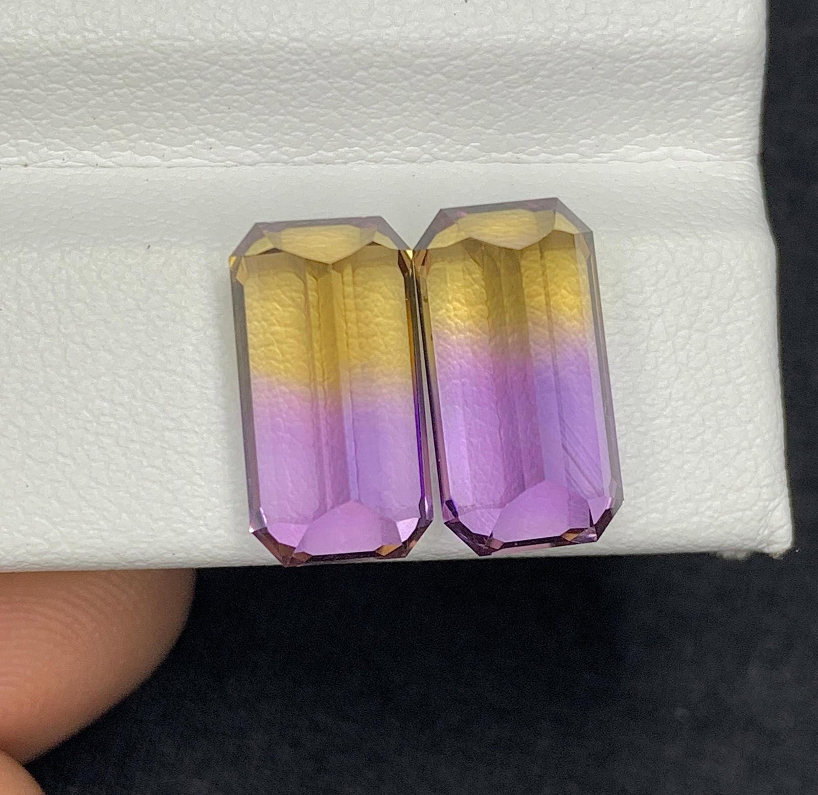 Emerald Cut Bolivian Ametrine Gemstone Pair: 11.30 CT, Royal Purple/Mango Yellow: Highlights Supplies for making crafts Materials: Gemstone: Ametrine Emerald Cut Bolivian Ametrine Gemstone Pair: Royal Purple/Mango Yellow Properties : Birthstone : February Birthstone Zodiac Sign :