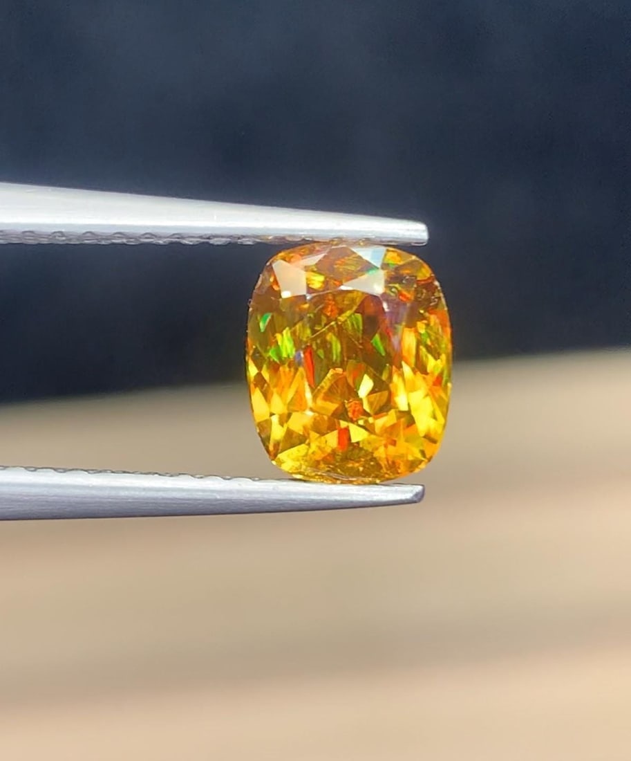 Ultra Fire Natural Titanite Sphene Cushion Cut Gemstone , March Birthstone - 1.60 Carat: Highlights Supplies for making crafts Materials: Gemstone: Sphene Carat weight: 1.60 This stunning full fire sphene titanite loose gemstone features a captivating long cushion cut that enhances its