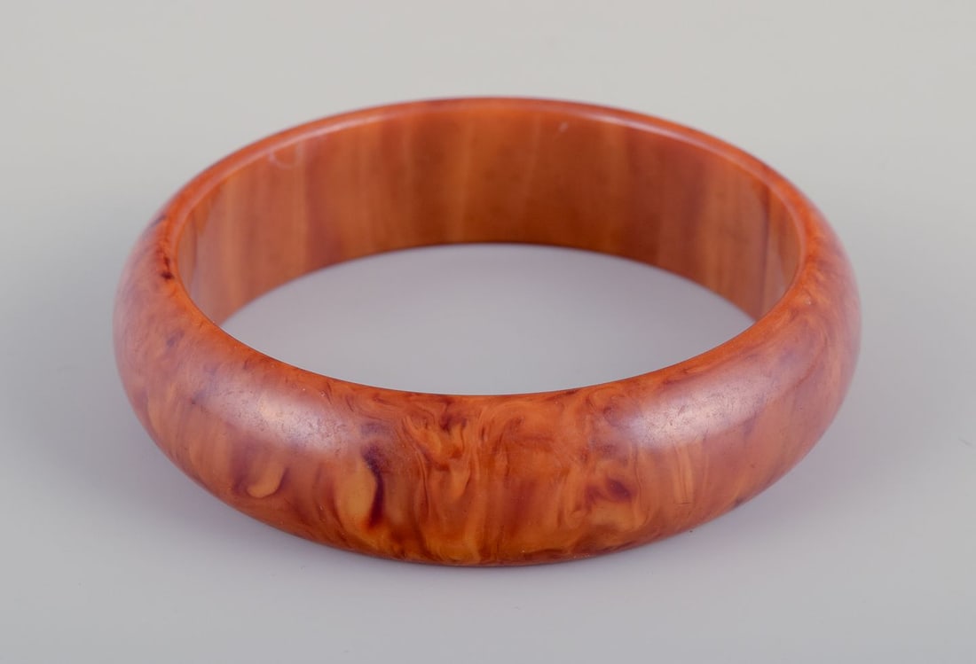 French jewelry designer. Three bracelets. Two in plastic and one in wood. Late 20th C. - 5