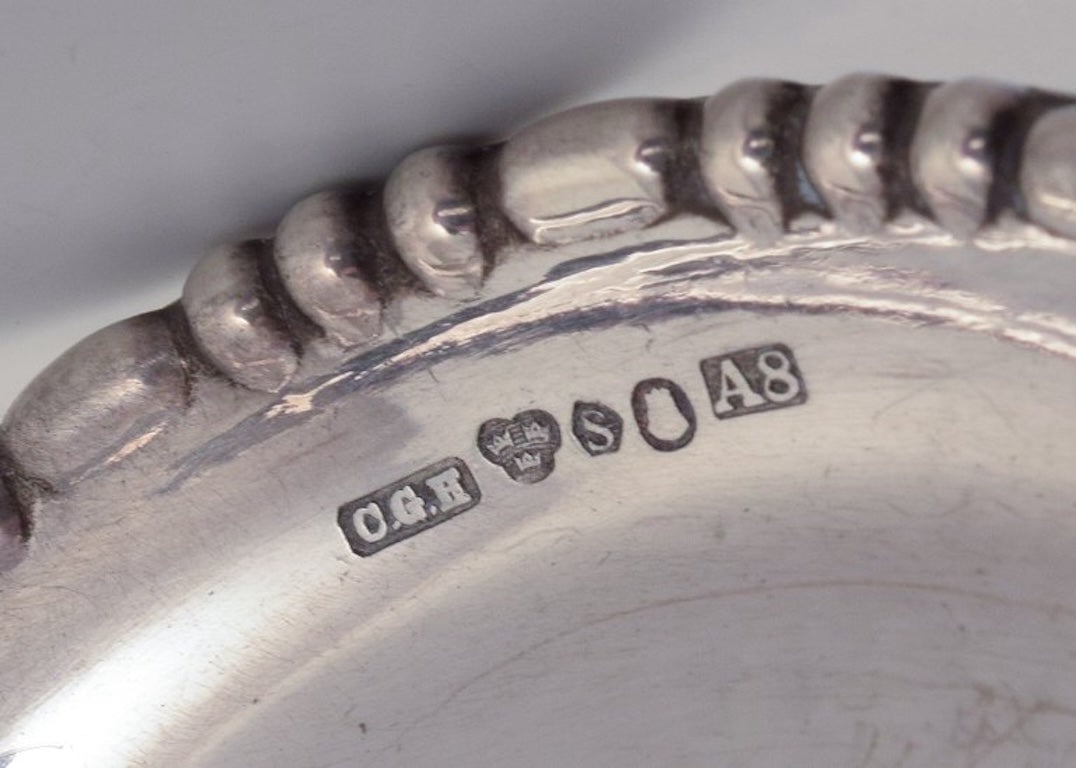 Hallberg, Stockholm. Royal Swedish Court Supplier. A set of twelve Art Deco glass coasters in 830 - 7