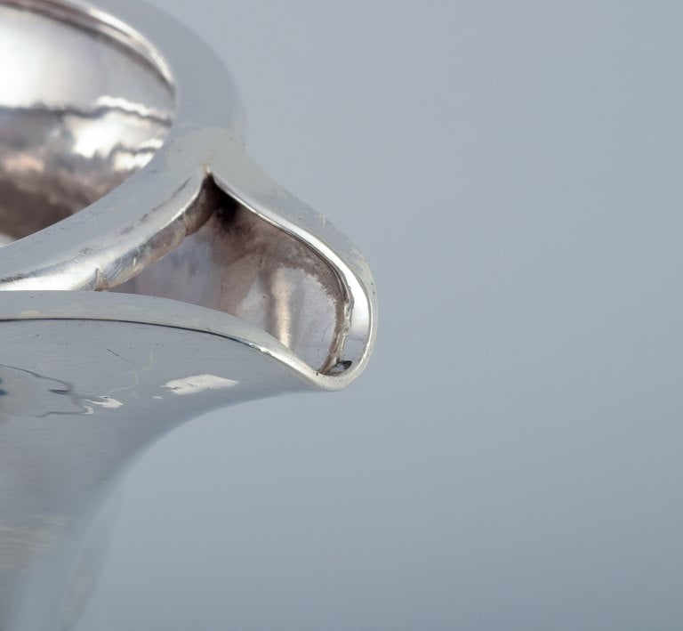 Georg Jensen, large Art Nouveau pitcher in sterling silver. Early and rare model. Hammered finish. - 9