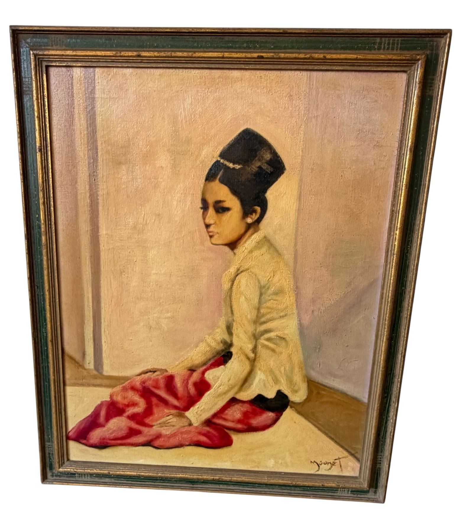 Mid-20th Century Portrait of a Seated Woman, Signed "Mouret": This oil on canvas painting, dating from the mid-20th century, depicts a graceful Asian woman seated on the floor, traditionally dressed. The subject is rendered with a thoughtful expression, gazing s