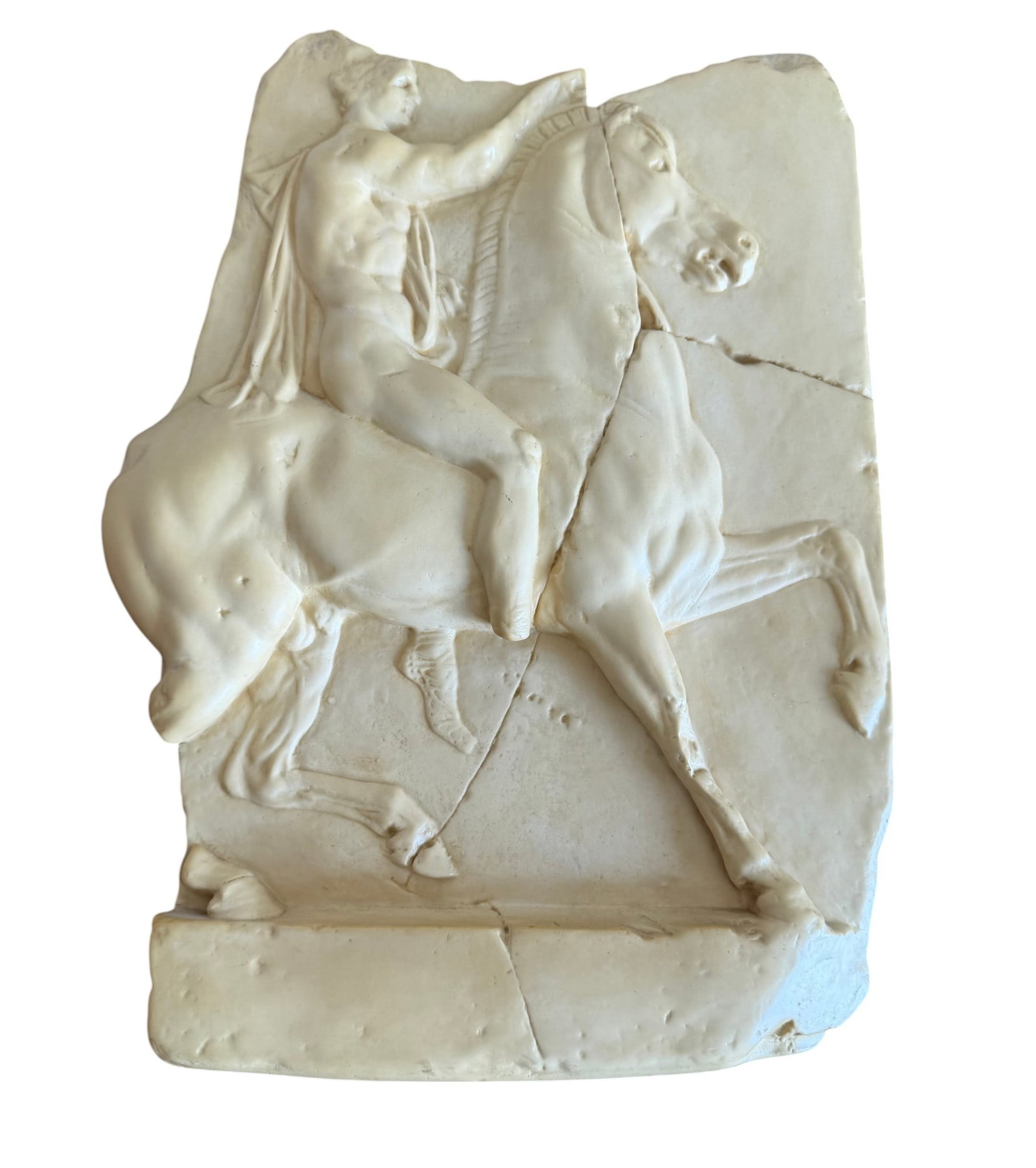 Grand Tour Style Plaster Plaque of a Horseman: This plaster plaque, rendered in the Grand Tour style, depicts a muscular classical horseman atop a spirited steed. The relief features dynamic composition and classical anatomical details. The
