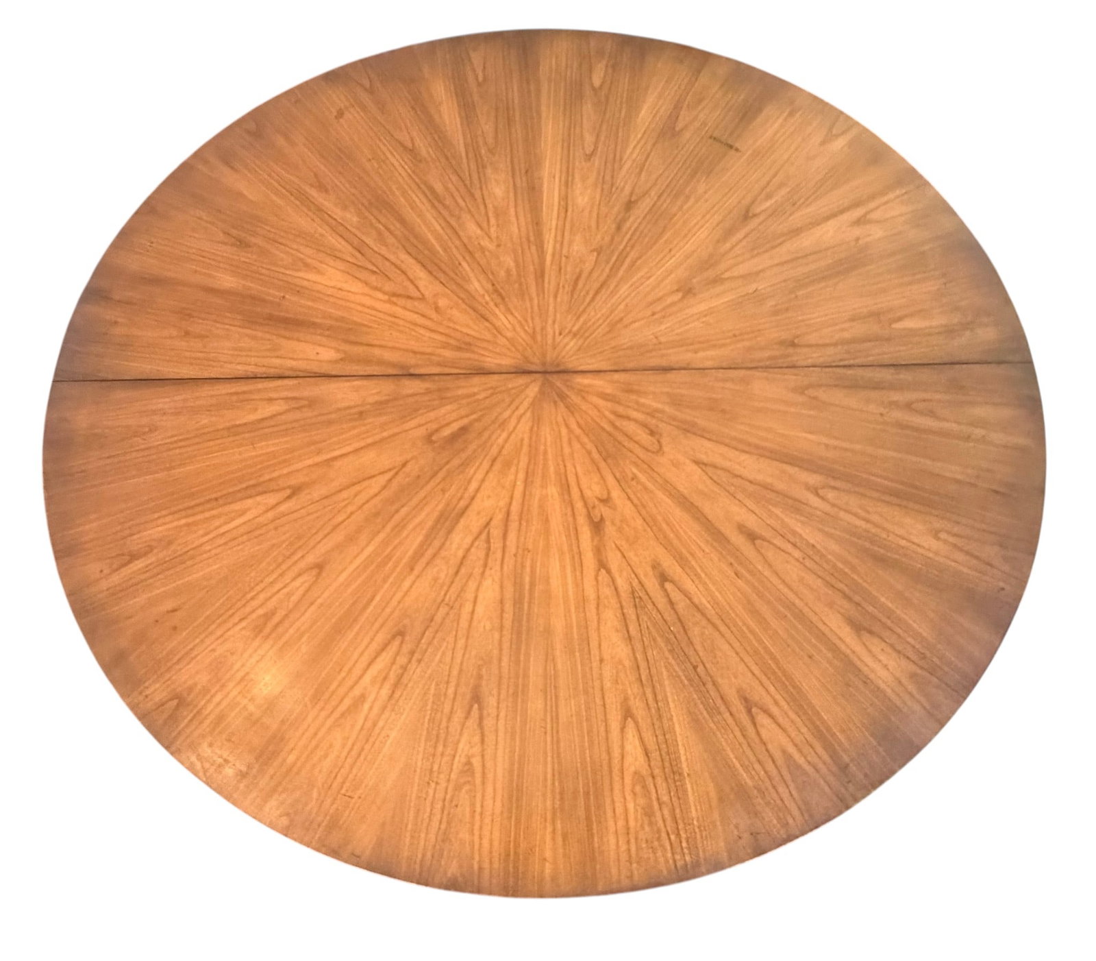 Baker Mid-20th Century Expanding Oval Pedestal Dining Table with Sunburst Veneer: An elegant oval dining table, likely crafted in the mid-20th century, featuring a striking sunburst veneered top. The table is supported by two substantial turned pedestals, each resting on a shaped