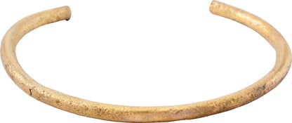 ROMAN WOMAN’S BRACELET, 1ST-3RD CENTURY AD.: Title: ROMAN WOMAN’S BRACELET, 1ST-3RD CENTURY AD. Description: Gilt bronze. Over 2 ½” (2.56”) inside dimension, C form, circular section expanding toward the terminals. Surface