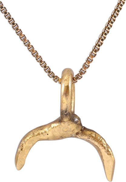 VIKING LUNAR PENDANT, 9TH-10TH CENTURY AD: Title: VIKING LUNAR PENDANT, 9TH-10TH CENTURY AD Description: Just over ½" (0.56") width. Crescent form with the ends tapering sharply from the swelled middle. As expert navigators, the constella