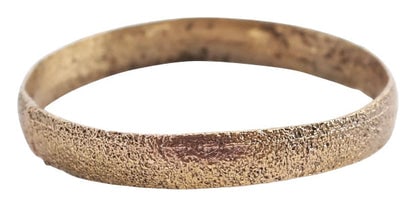 ANCIENT VIKING WEDDING RING C.1000 AD, SIZE 4 1/2: Title: ANCIENT VIKING WEDDING RING C.1000 AD, SIZE 4 1/2 Description: Gilt bronze. Wearable size 4 1/2, 2.2mm width, with low rounded face. Surface textured from burial. Vikings exchanged rings on the