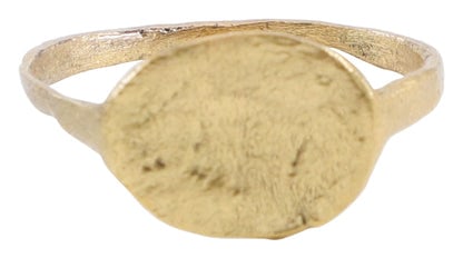 FINE ROMAN WOMAN’S RING C.100-400 AD, SIZE 8 1/2: Title: FINE ROMAN WOMAN’S RING C.100-400 AD, SIZE 8 1/2 Description: Gilt bronze, size 8 1/2. Flat face band, 1.4mm. Oval bezel possibly once cut with a signet, now textured from burial. Profess